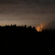 Plane wreckage from the stolen Q400 burns on Ketron Island, Washington.